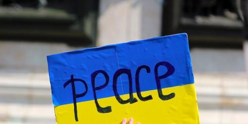 Ukraine flag at protest for peace